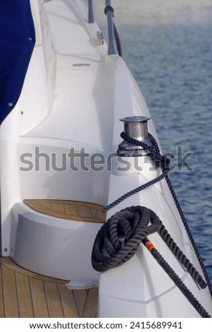 Italy, Sicily, Mediterranean Sea, Marina di Ragusa (Ragusa Province); winch and nautical ropes on a luxury yacht in the port 