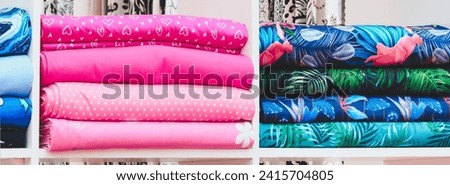 Multi-colored textiles on the shelves in the market