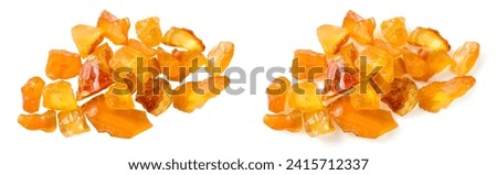 Crushed amber isolated on white background Royalty-Free Stock Photo #2415712337