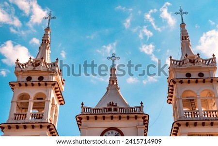 Crosses of the towers of the parish of San Cristóbal in Mazamitla, lower angle. Royalty-Free Stock Photo #2415714909