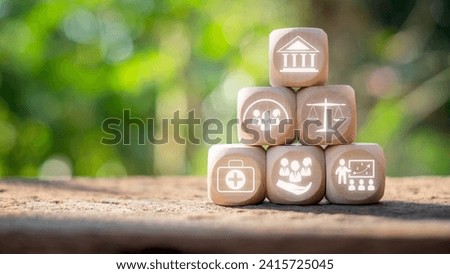 Social policy concept. Wooden block on desk with Social policy icon on virtual screen. Government, Political Science, Legislation, Social Services, Labor, Welfare, Reform, Education.