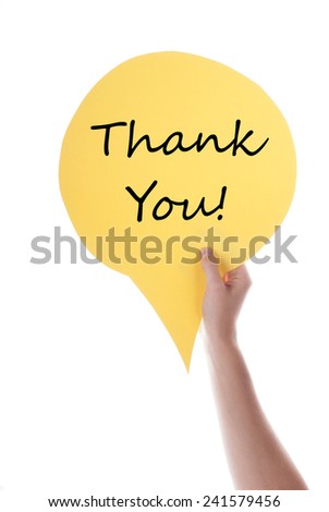 Hand Holding A Yellow Speech Balloon Or Speech Bubble With Thank You. Isolated Photo.