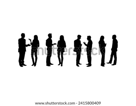 Two people having a discussion silhouette. Two business people having a conversation. Royalty-Free Stock Photo #2415800409