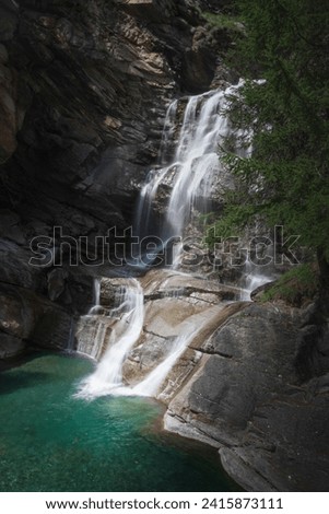 Lillaz waterfalls in summer, the topmost part. Cogne, Aosta Valley, Italy Royalty-Free Stock Photo #2415873111