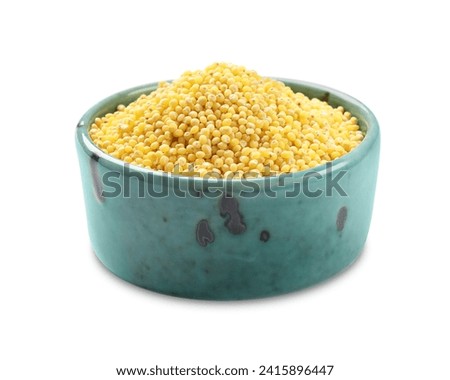 Dry millet seeds in bowl isolated on white