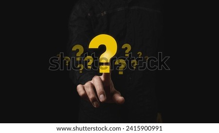 Question marks on a black background, searching for a solution in an unknown situation. Man develops idea of creativity and inspiration, sustainable business concept
