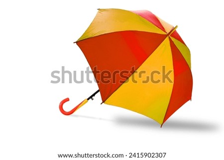 Stripe umbrellas Red and Yellow color with handle, isolated with clipping path selection on white background. Object or Rainy season concept.