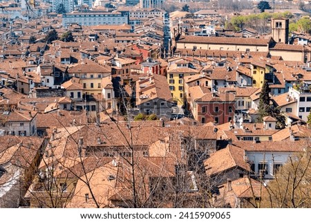 view to the red roofs of the old town in Brescia, Italy