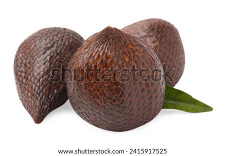 Delicious salak fruits and green leaf isolated on white