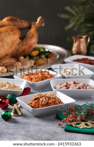 turkey with appetizers. The Christmas table is served with a turkey. delicious snacks. grilled turkey. Traditional holiday food for Christmas. Fried chicken.
