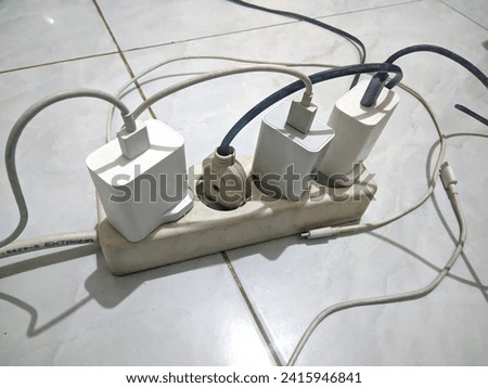 Electrical contact cables with various cables sticking out untidy Royalty-Free Stock Photo #2415946841