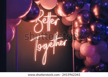 Better Together - neon sign with balloons at a wedding party. Love concept