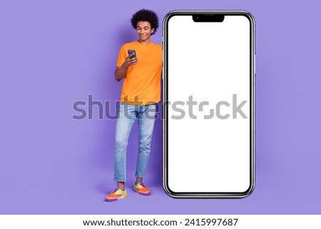 Full body size cadre of student hipster guy chevelure hair browsing gadget apple phone display twitter isolated on violet color background