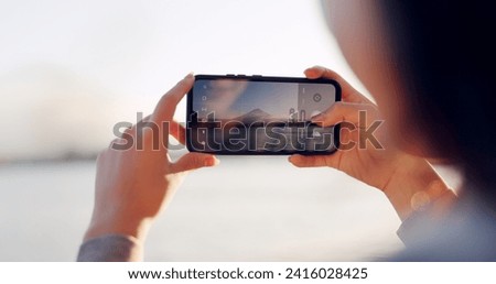 Hands, phone and photography by lake, mountain and nature with landscape, horizon and outdoor adventure. Person, smartphone screen and camera for Mt Fuji, memory and post on social media in Japan