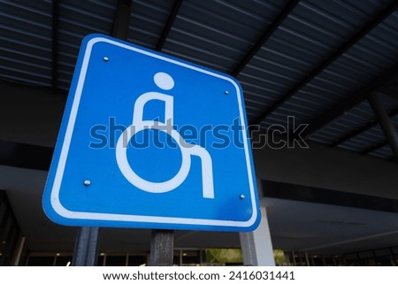 Blue handicapped sign parking spot, disabled parking permit sign, accessibility concept