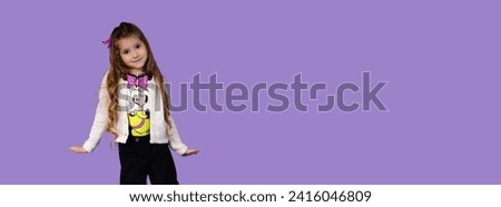 The picture represents a purple banner or we can change the color, on the picture there is a small and tender girl who has many emotions and is very attractive for advertisements.