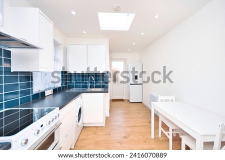 Garage Conversion kitchen dining 1 Bed House in London UK Royalty-Free Stock Photo #2416070889