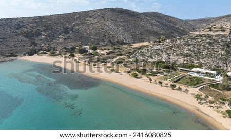 Aerial drone photo of paradise sandy beach of Livadi next to abandoned ruins of castle of Iraklia island, Small Cyclades islands, Greece