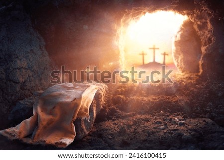 Resurrection Of Jesus Christ - Empty Tomb -  Focus On Shroud With Defocused Crosses On Background - flare Effects and Bokeh Lights Royalty-Free Stock Photo #2416100415