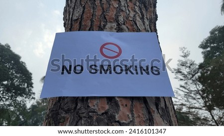 No smoking sign on tree, No Tobacco Day