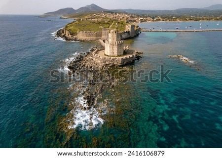 Aerial drone view of Methoni Castle with methoni village as a background   in Messinia, Greece
