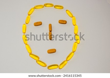 some pills form a happy face