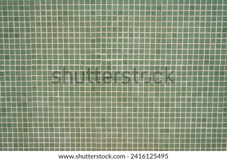 green background with squares, mosaic tile