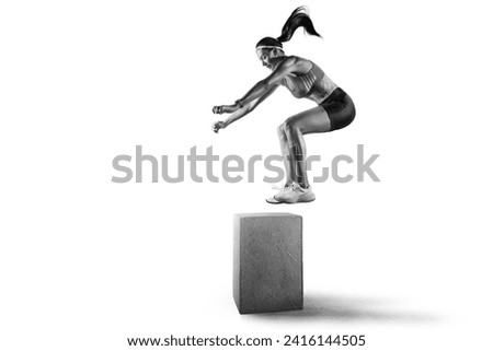 Black and white photo. Sporty young girl is training, jumping on the bar.