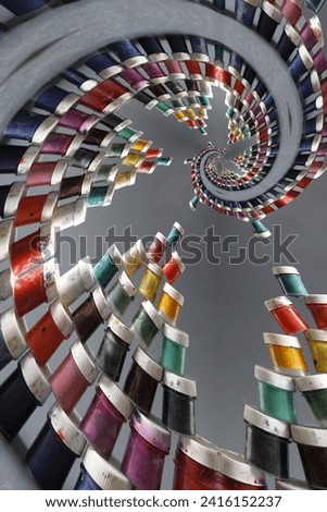 Abstract photograph of acrylic curves in mirror reflection.