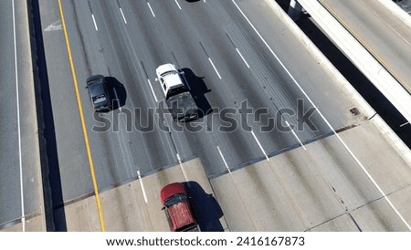 Traffic on a busy highway in Houston, Texas during the afternoon rush hour