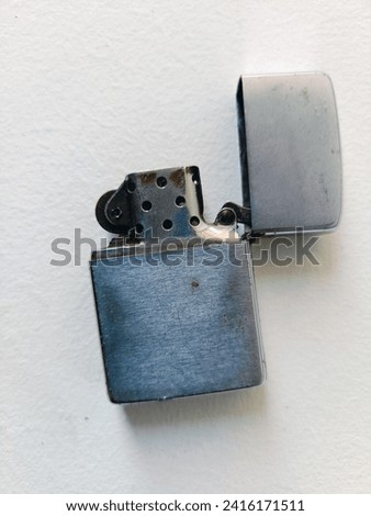 Old cigarette Lighter isolated on white background.
