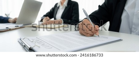Two business executive in boardroom discuss term and company merging agreement, review corporate contract document as business partnership and cooperation with acquisition and merger concept. Shrewd