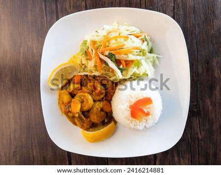 Curry Shrimp with white rice and cabbage 