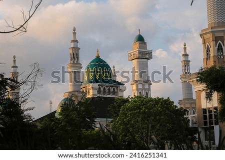 background wallpaper of large mosque in the middle of the forest