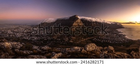 The incredible view from Lion's Head over Table Mountain, Cape Town and Camps Bay at sunset, Cape Town, South Africa. Royalty-Free Stock Photo #2416282171