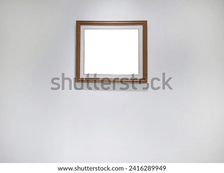 An empty vertical picture frames hanging on white wall, Wall art mockup, blank space frame modern interior style, minimalist with clipping path