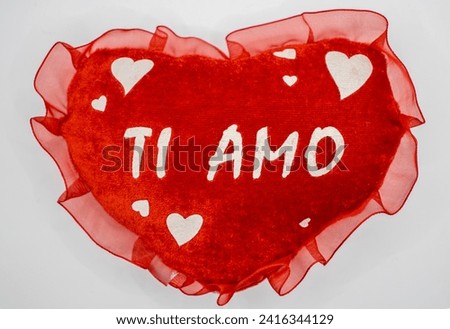 An emotional image showcases a red heart with I love you written in Italian. A romantic and expressive gesture illustrating love and tenderness in a simple yet profound manner