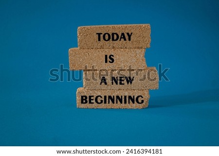 Today is a new beginning symbol. Concept words Today is a new beginning on brick blocks. Beautiful blue background. Business, today is a new beginning concept. Copy space. Royalty-Free Stock Photo #2416394181