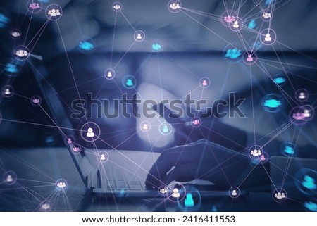 Close up of hands using laptop computer and phone with connected digital people team icons on blurry purple background. Digital network, online community and social media concept. Double exposure