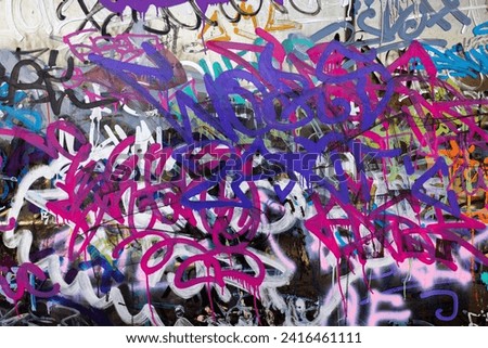 Beautiful underground street art. Abstract creative patterns of trendy colors on city walls. Urban contemporary culture. Abstract stylish drawing, wall mark, tag, graffiti fragment marking, Street art