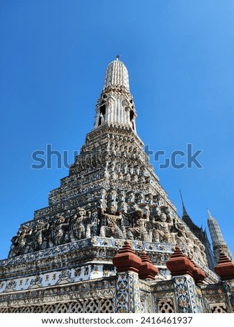 Wat Arun is one of the most famous landmarks in Bangkok. Located along the Chao Phraya River, it has the highest prang in Thailand. Royalty-Free Stock Photo #2416461937