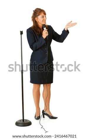 Series with an adult female in a suit, playing the part of a United States politician.  Different props provide a variety of concepts.  Isolated on a white background. Royalty-Free Stock Photo #2416467021
