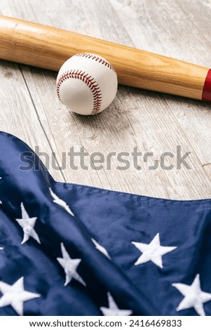 Image with copyspace, good for baseball or summer themed design and advertising. Includes American flag.