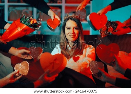 
Woman Wearing a Queen Crown Receiving Many Gifts. Attractive princess being surrounded with attention and love from everyone
 Royalty-Free Stock Photo #2416470075