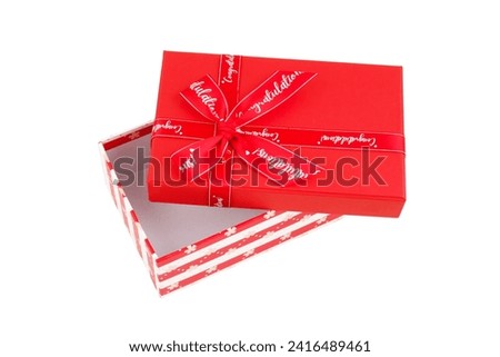 Open red gift box with red bow isolated on white background	
