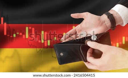 Crisis in Germany. Empty wallet in hands of unemployed man. Germany flag with crisis chart. Economic recession. Financial crisis. Man became bankrupt. Falling Germany income. Devaluation, inflation Royalty-Free Stock Photo #2416504415