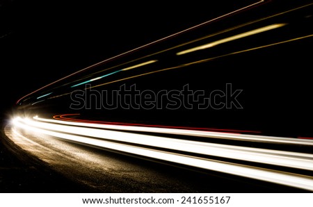 light trails in tunnel. Art image . Long exposure photo taken in a tunnel 