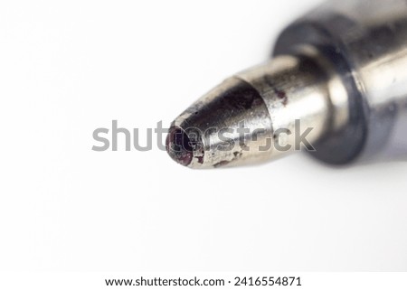 Macro Close-up Detail of a Worn Ballpoint Pen Tip, Used Writing Instrument for Office Supplies and Professional Business Communication Royalty-Free Stock Photo #2416554871