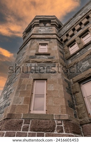 Cabot Tower on Signal Hill in St. John's, Newfoundland, Canada. National Historic Site where the first transatlantic wireless transmission was received by Guglielmo Marconi. Royalty-Free Stock Photo #2416601453