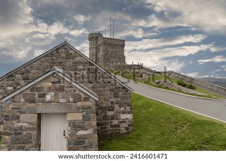 Cabot Tower on Signal Hill in St. John's, Newfoundland, Canada. National Historic Site where the first transatlantic wireless transmission was received by Guglielmo Marconi. South Half Moon Battery.  Royalty-Free Stock Photo #2416601471